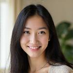 Portrait of Sarah Chen, a warm and empathetic woman with inviting eyes and a gentle smile, exuding trustworthiness.
